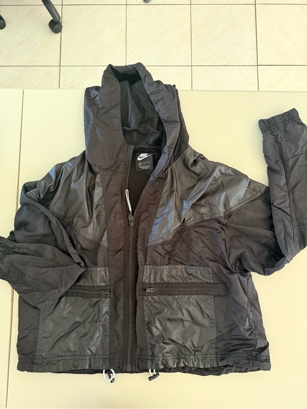 Nike Black Hooded Windbreaker with Shiny Accent Panels